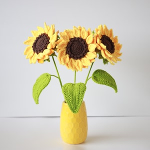 Häkelanleitung für SONNENBLUME. Häkelblumen. Sonnenblume mit Blättern. Amigurumi Schnittmuster. Häkelanleitung für Heimdekor.