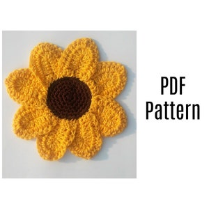 May include: Crochet pattern for a sunflower with yellow petals and a brown centre. The pattern is available as a PDF download.