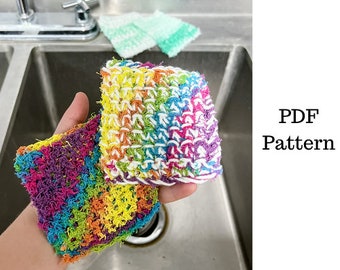 Puede incluir: Dos paños de cocina de ganchillo coloridos, uno con un patrón de arcoíris y el otro con un patrón blanco y arcoíris.  Patrón PDF.
