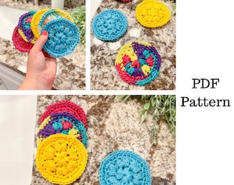 May include: A set of colorful crocheted coasters in various colors, including yellow, blue, pink, and purple. The coasters are arranged in a stack and on a countertop. The image includes the text "PDF Pattern".