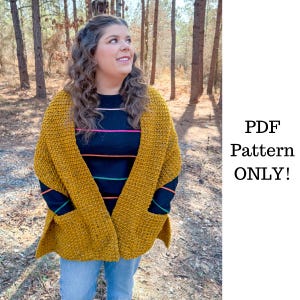 May include: A mustard yellow crochet shawl with pockets. The shawl is worn over a navy blue striped shirt and blue jeans. The text "PDF Pattern ONLY!" is visible in the image.