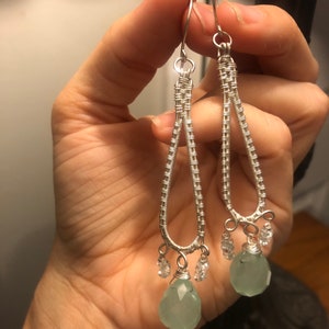 Sterling silver and aquamarine handwoven earrings.