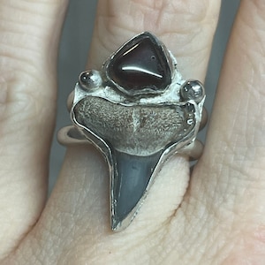 Garnet and shark tooth ring