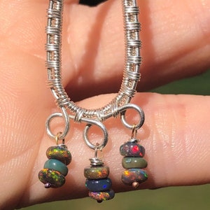 Sterling silver and black opal earrings
