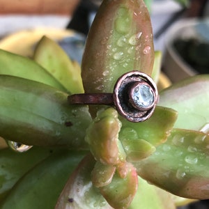 Diamond and copper solitaire ring