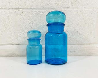 Vintage blå glas apoteksburkar belgiska set
