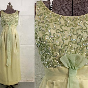megan draper gold dress Mad Men' Costume Designer on Jessica Pare's 'Zou Bisou' Minidress and Black Lace Lingerie