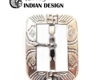 May include: Silver-toned metal buckle with a geometric design. The buckle has a square shape with rounded corners and features a swastika symbol in the center. The text "1930's Style INDIAN DESIGN" is printed above the buckle.