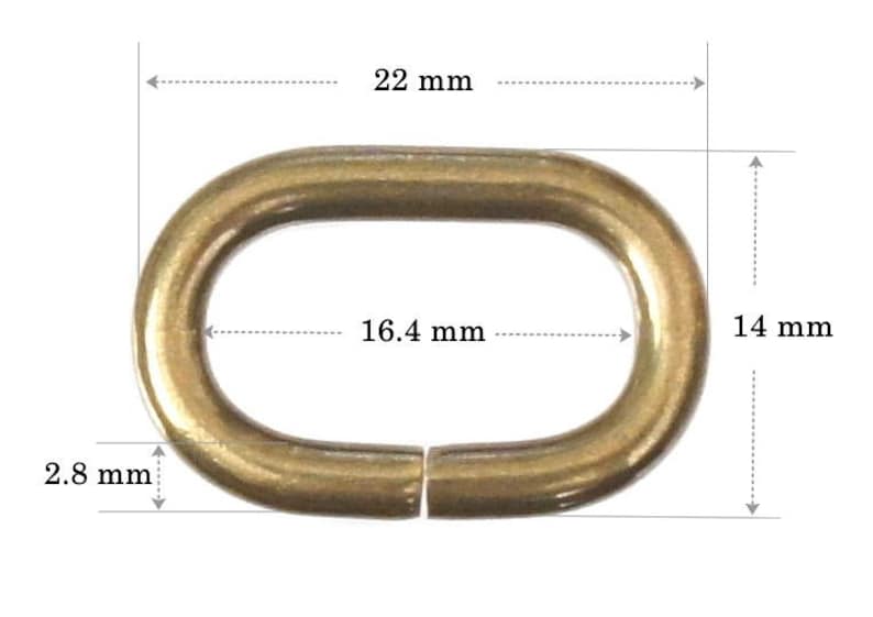 May include: Gold-toned metal oval ring with a 22 mm outer diameter, 16.4 mm inner diameter, and 14 mm height. The ring is 2.8 mm thick.