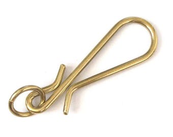 May include: A gold-colored metal hook with a loop on one end and a hook on the other end.