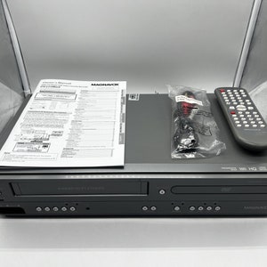 Pre-Owned Magnavox DV225MG9 DVD/VCR Combo Player - w/ Line-in Recording, Original Remote, Manual, A/V Cables, & HDMI Converter