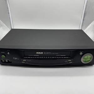 Restored RCA VR702HF 4-Head VCR Player w/ Pre-programmed Universal Remote, A/V Cables, & HDMI Converter