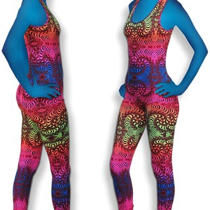 May include: A one-piece jumpsuit with a colorful psychedelic pattern. The jumpsuit has a scoop neck and sleeveless design. The model is wearing blue shoes.