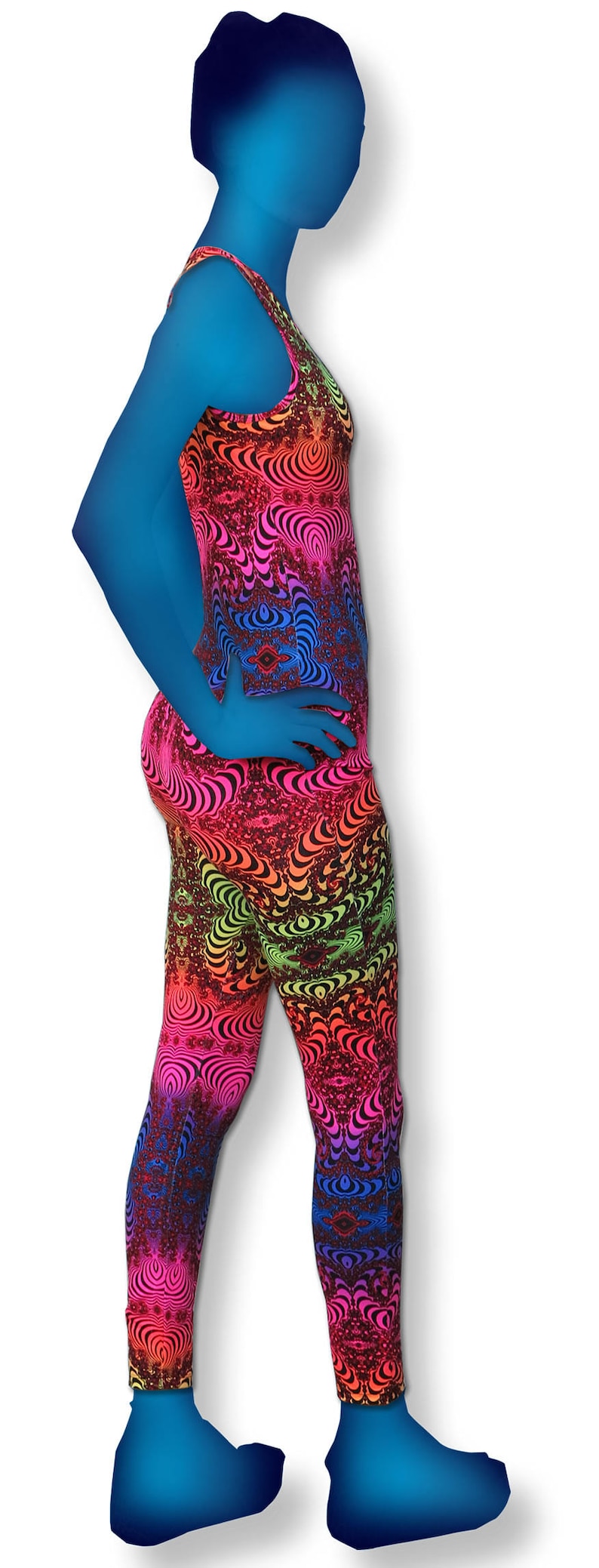 May include: A pair of leggings with a colorful psychedelic pattern. The leggings are made of a stretchy fabric and have a high waist.