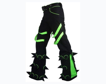 Pantaloni Spikey: pantaloni neri con punte morbide, profili UV Lime e inserti svasati, vestibilità slim, zip sulle gambe. Pantaloni rave, pantaloni da festival, pantaloni punk