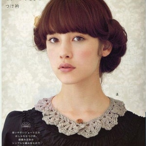 May include: A woman with brown hair and bangs is wearing a black top with a crocheted collar. The collar is beige and has a button closure. The text on the image reads "Short length & Motif connection collar"