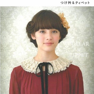 May include: A woman wearing a red dress with a white crocheted collar and a black velvet bow. The collar is decorated with lace. The text "COLLAR & TIPPET" is visible in the image.
