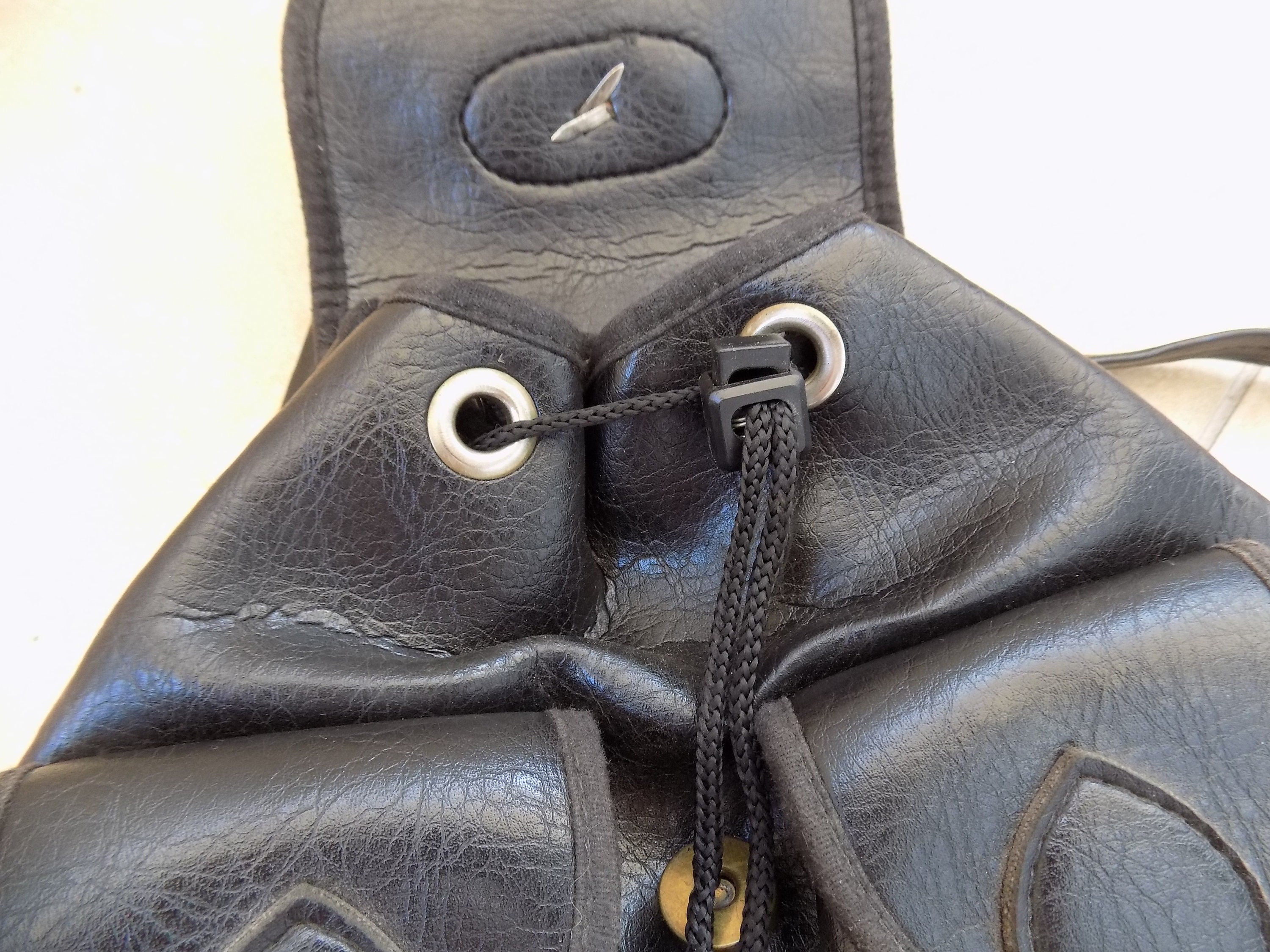 vintage black leather backpack