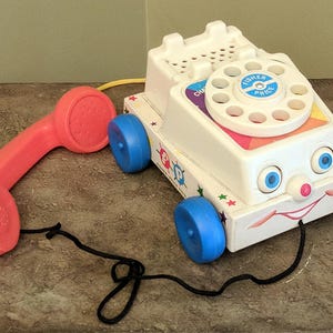 Vintage Fisher Price Pull Toy Chatter Telephone Smiley Face Phone for Toddlers Educational Toy Communications image 5