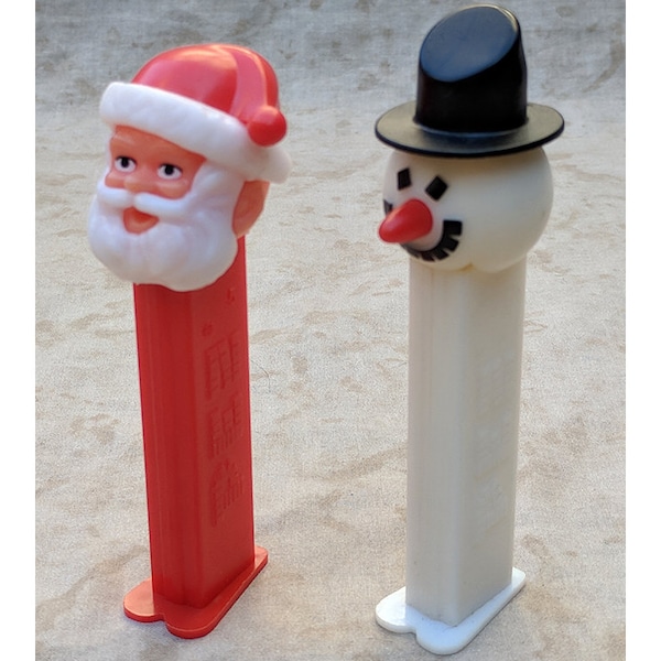 Vintage Retired PEZ Dispenser with Feet Candy Collectible Ephemera Christmas Holiday Frosty the Snowman No. 5 & Santa Claus Made in Slovenia