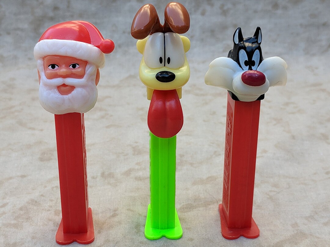Vintage Retired PEZ Dispenser With Feet Candy Collectible