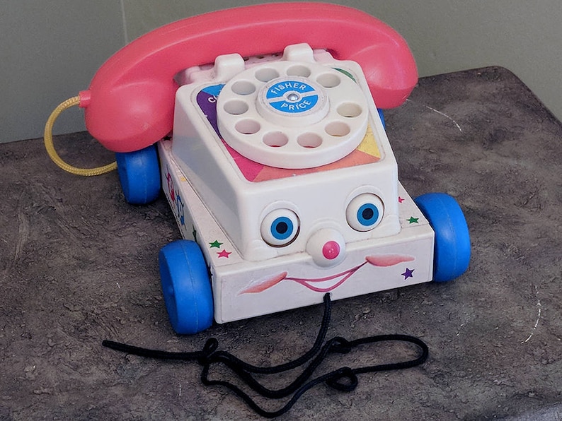 Vintage Fisher Price Pull Toy Chatter Telephone Smiley Face Phone for Toddlers Educational Toy Communications image 1