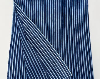 Vintage blue and white striped mud cloth throw. Authentic African textile for home decor
