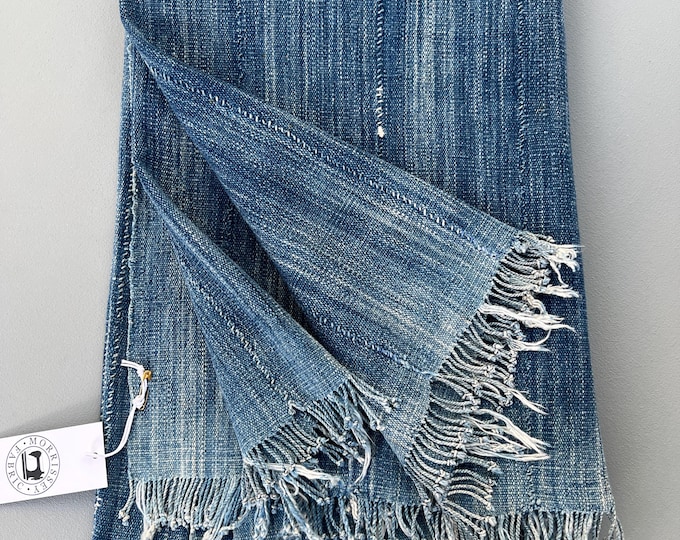 Blue mud cloth throw for a wabi sabi home decor vibe. Boho farmhouse textile with hand embroidered patch.