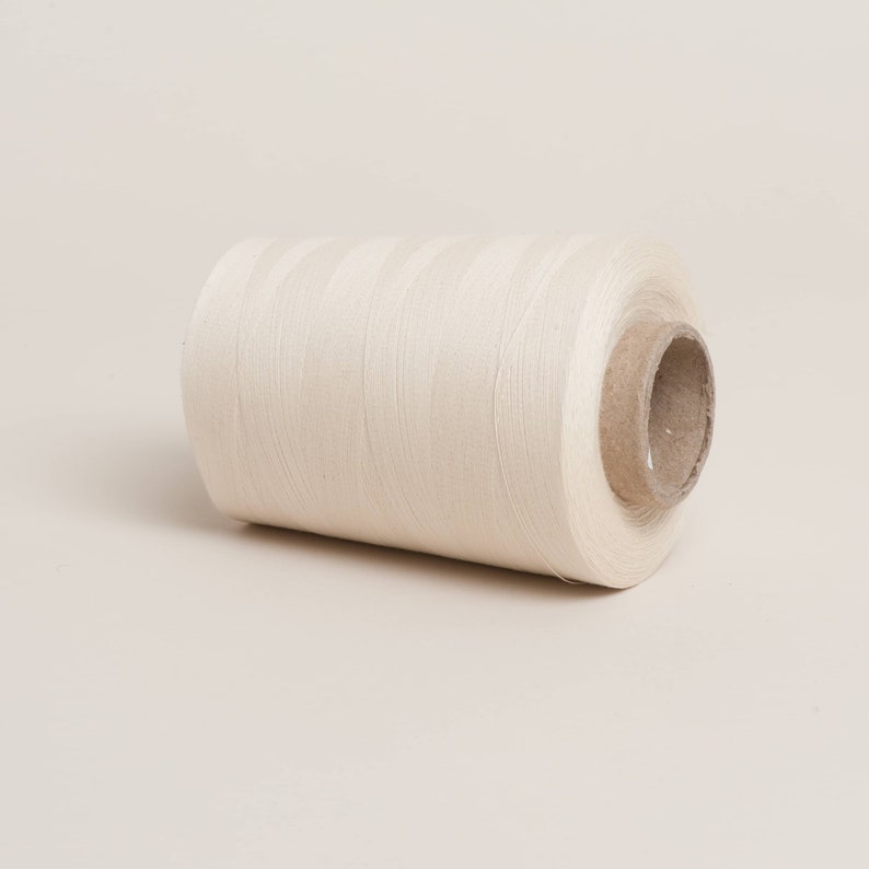 Raw unbleached cotton overlocker spool on cardboard cone with paper wrap. 100% Plastic free and biodegradable image 2