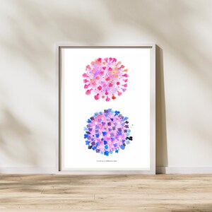 May include: A framed watercolor print featuring two stylized virus illustrations. The top virus is a vibrant mix of pink, red, and orange, while the bottom one is a blend of blue and purple. The text "Covid-19 & Influenza Virus" is at the bottom.