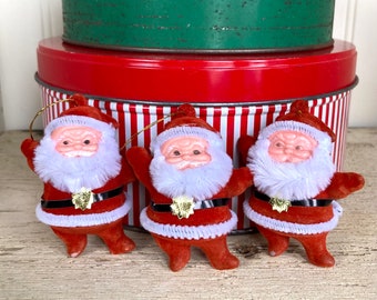 set of three mini flocked Santa ornaments