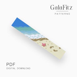 May include: A digital download pattern with a beach scene design. The pattern features a blue sky, ocean waves, tan sand, and a pink starfish. The text "GalaFitz PATTERNS" and "PDF DIGITAL DOWNLOAD" are also visible.
