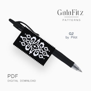 May include: A black and white beaded pen topper with a geometric design. The pen topper is attached to a black pen. The text "GalaFitz PATTERNS G2 by Pilot" is visible in the image.