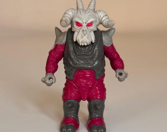 Figura de juguete de Hasbro Takara Transformers Pretenders Skullgrin de 1987