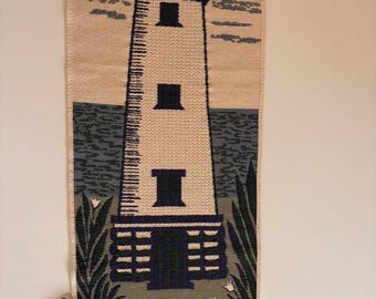 Arazzo da parete a forma di faro in tessuto Hanhisalo
