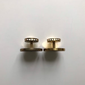 Aarikka brass tealight holder set of II