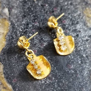 Gold Curved Disc Earrings with rhinestone charm