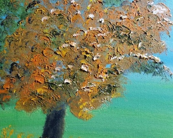 May include: A painting of a tree with orange and yellow leaves against a blue sky. The tree is in the foreground and the sky is in the background. The tree is painted with thick brushstrokes and the leaves are textured.