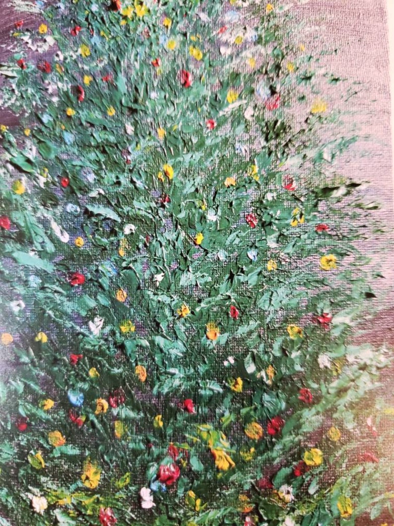 May include: Impasto oil painting of a tree with green foliage and colourful flowers. The artwork features a textured surface with visible brushstrokes. Red, yellow, and white flowers are scattered throughout the tree's branches.