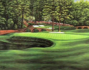 May include: A painting of a golf course with a green fairway, a green putting green, and a stone bridge. The course is surrounded by trees and bushes. The painting is signed by the artist, "Marci L. Robin".