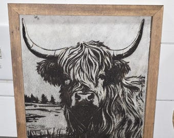 Imagen de vaca de las Highlands grabada en piel de vaca auténtica