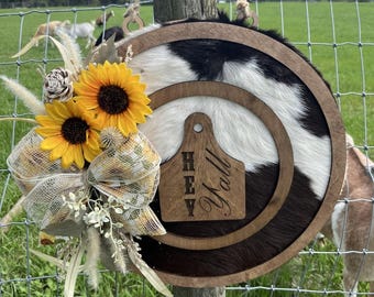 Authentic cowhide door hanger. wood flowers