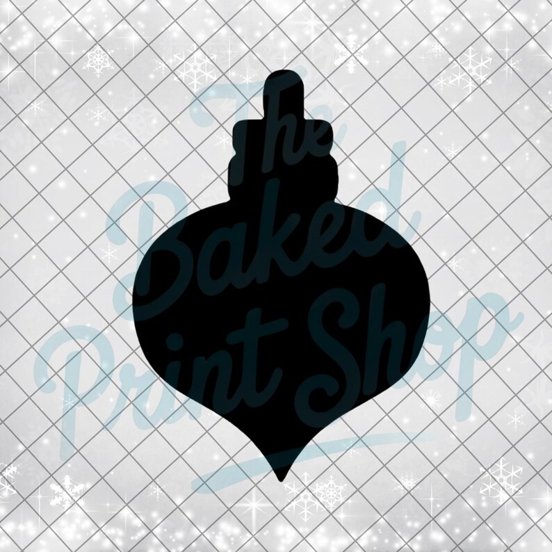 May include: Black silhouette of a Christmas ornament with a decorative top. The text "The Baked Print Shop" is visible on the ornament. The background is a white grid pattern with snowflakes.