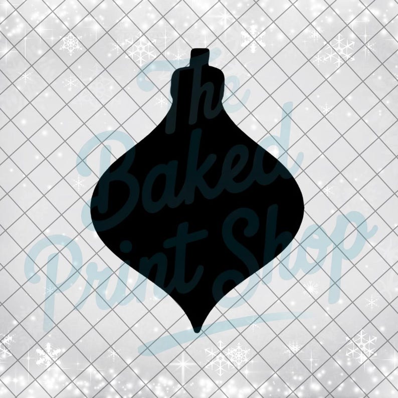 May include: Black silhouette of a Christmas ornament with a rounded body and a small, cylindrical top. The ornament shape is set against a white background with a grid pattern and snowflake accents. The text "The Baked Print Shop" is visible.