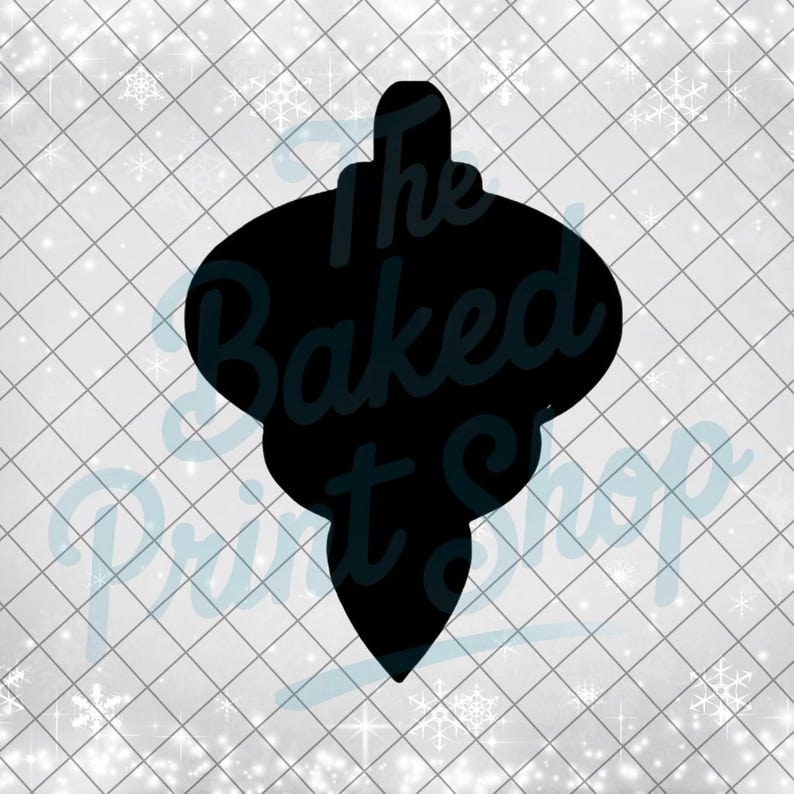 May include: Black silhouette of a Christmas ornament with a decorative shape. The text "The Baked Print Shop" is overlaid on the ornament. The background is a white grid pattern with snowflake accents.
