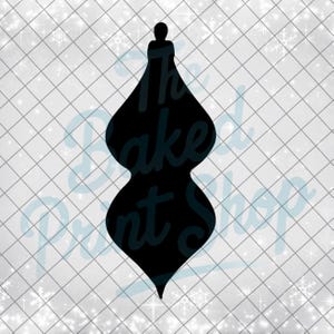 May include: Black silhouette of a Christmas ornament with a teardrop shape. The ornament has a small loop at the top for hanging. The background is white with a grid pattern and snowflakes.