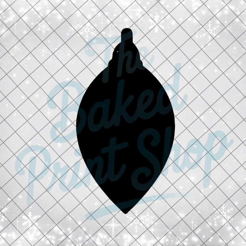 May include: A black teardrop-shaped Christmas ornament silhouette. The ornament has a small loop at the top for hanging. The background is a white grid pattern with scattered snowflakes, and the text "The Baked Print Shop" is visible.