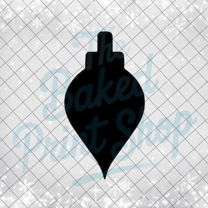 May include: Black Christmas ornament silhouette with a teardrop shape, featuring a top loop for hanging. The ornament is set against a white background with a grid pattern and snowflake accents. The text "The Baked Print Shop" is visible.