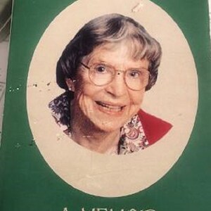 May include: A green book cover with the title "Did I Ever Tell You?" in white text. A photo of an older woman with glasses and a red shirt is in a circle on the cover. The text "A Memoir" is below the photo and the author's name "Georgialee Weigel Granger" is below that.