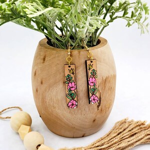 Laser cut, engraved & hand painted floral bar style earrings on Cherry
